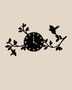 Gloss black acrylic wall clock with laser-cut branches, leaves and two small birds spreading asymmetrically either side of the dial, mounted on a pale wall.