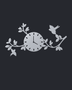 Silver mirror chrome acrylic wall clock with a branch, leaf and bird design framing the dial, float-mounted on a light wall.