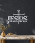 JESUS wall art in Silver mirror chrome acrylic, heavy block letters with a cross and nails set into the lettering and a banner beneath reading The Way, The Truth, The Life, float-mounted on a pale wall