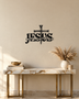JESUS wall art in gloss piano black acrylic, heavy block letters with a cross and nails set into the lettering and a banner beneath reading The Way, The Truth, The Life, float-mounted on a pale wall