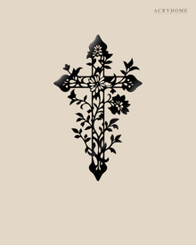 Floral filigree cross wall art in gloss piano black acrylic, float-mounted on a pale wall