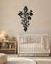 Floral filigree cross wall art in gloss piano black acrylic, float-mounted on a pale wall