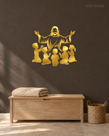 Silhouette of Jesus with arms outstretched above kneeling children, laser-cut in mirror gold acrylic and float-mounted on a pale wall.