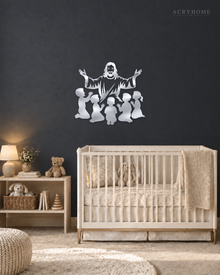 Silhouette of Jesus with arms outstretched above kneeling children, laser-cut in mirror silver acrylic and float-mounted on a pale wall.