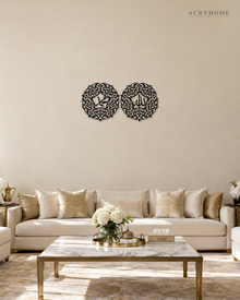 Pair of Arabic Calligraphy Roundels Wall Art in gloss piano black acrylic, float-mounted on a pale ivory wall.
