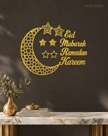 Crescent Moon and Stars Ramadan Wall Art in mirror gold acrylic, float-mounted on a deep charcoal wall.