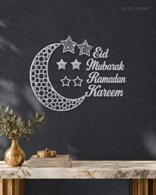Crescent Moon and Stars Ramadan Wall Art in mirror silver acrylic, float-mounted on a deep graphite wall.