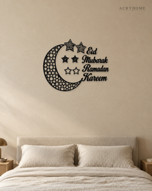 Crescent Moon and Stars Ramadan Wall Art in gloss piano black acrylic, float-mounted on a pale ivory wall.