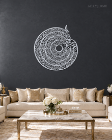 Spiral Qur'anic Calligraphy Disc — Acrylic Islamic Wall Art in mirror silver acrylic, float-mounted on a deep graphite wall