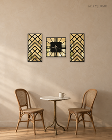 Three-piece art deco clock and panel set hung above a sofa in a living room, black chevron lattice over gold mirror.