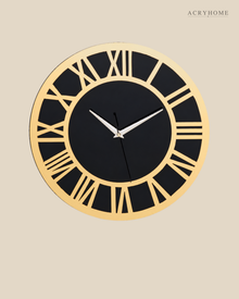 Flat view of the round Roman numeral clock, gold mirror ring around a black face.
