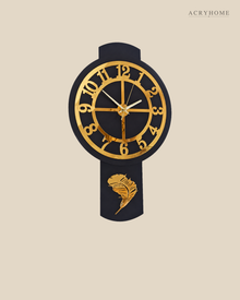 Flat view of the pendulum clock — gold-spoked dial above a black drop with a gold leaf.