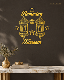 Ramadan Kareem Lanterns — Acrylic Islamic Wall Art in mirror gold acrylic, float-mounted on a deep charcoal wall