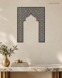 Mihrab Arch Geometric Lattice — Acrylic Islamic Wall Art in gloss piano black acrylic, float-mounted on a warm ivory wall