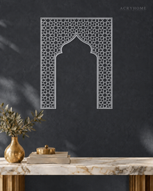 Mihrab Arch Geometric Lattice — Acrylic Islamic Wall Art in mirror silver acrylic, float-mounted on a deep graphite wall