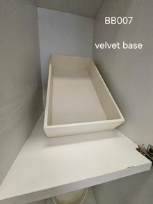 Shallow ivory rectangular tray with velvet base