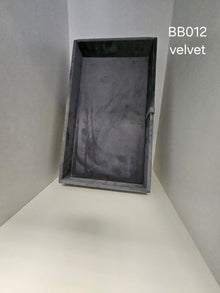 Rectangular tray lined in grey velvet