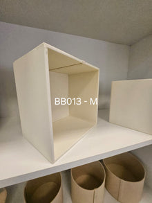 Open-topped ivory cube box