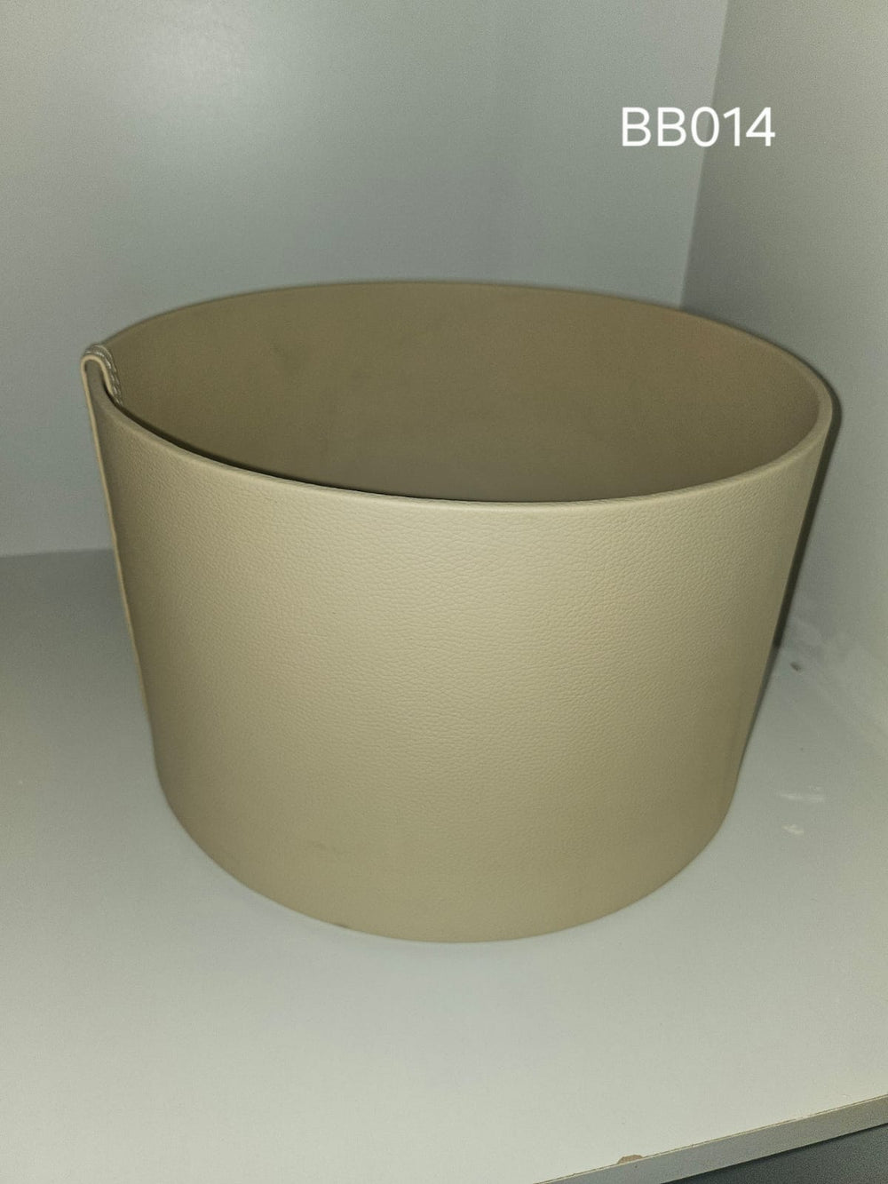Tapered round box in warm sand