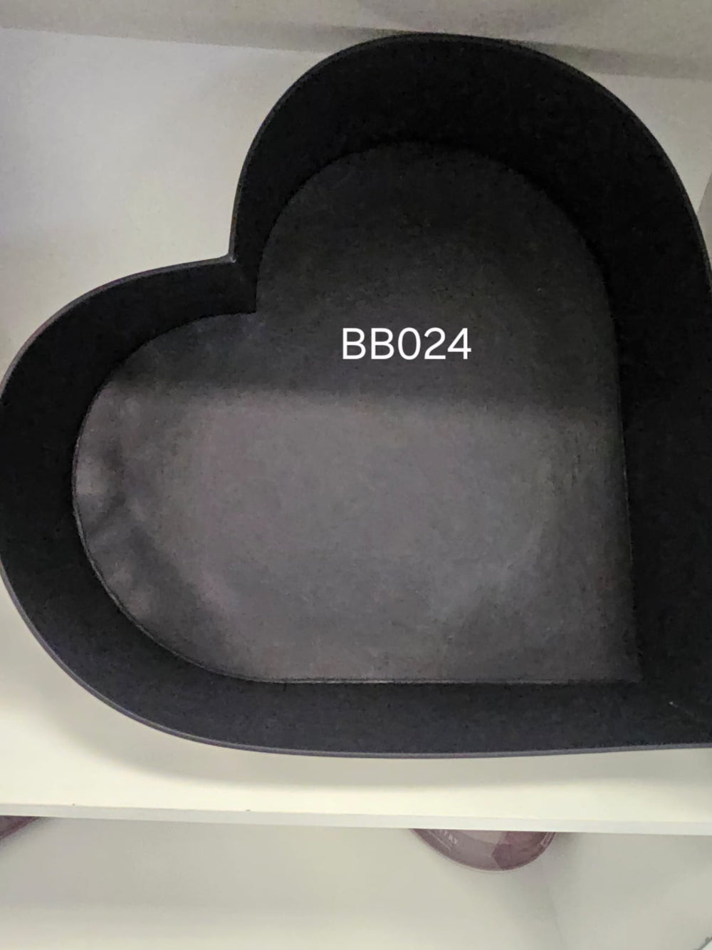 Heart-shaped box lined in charcoal velvet
