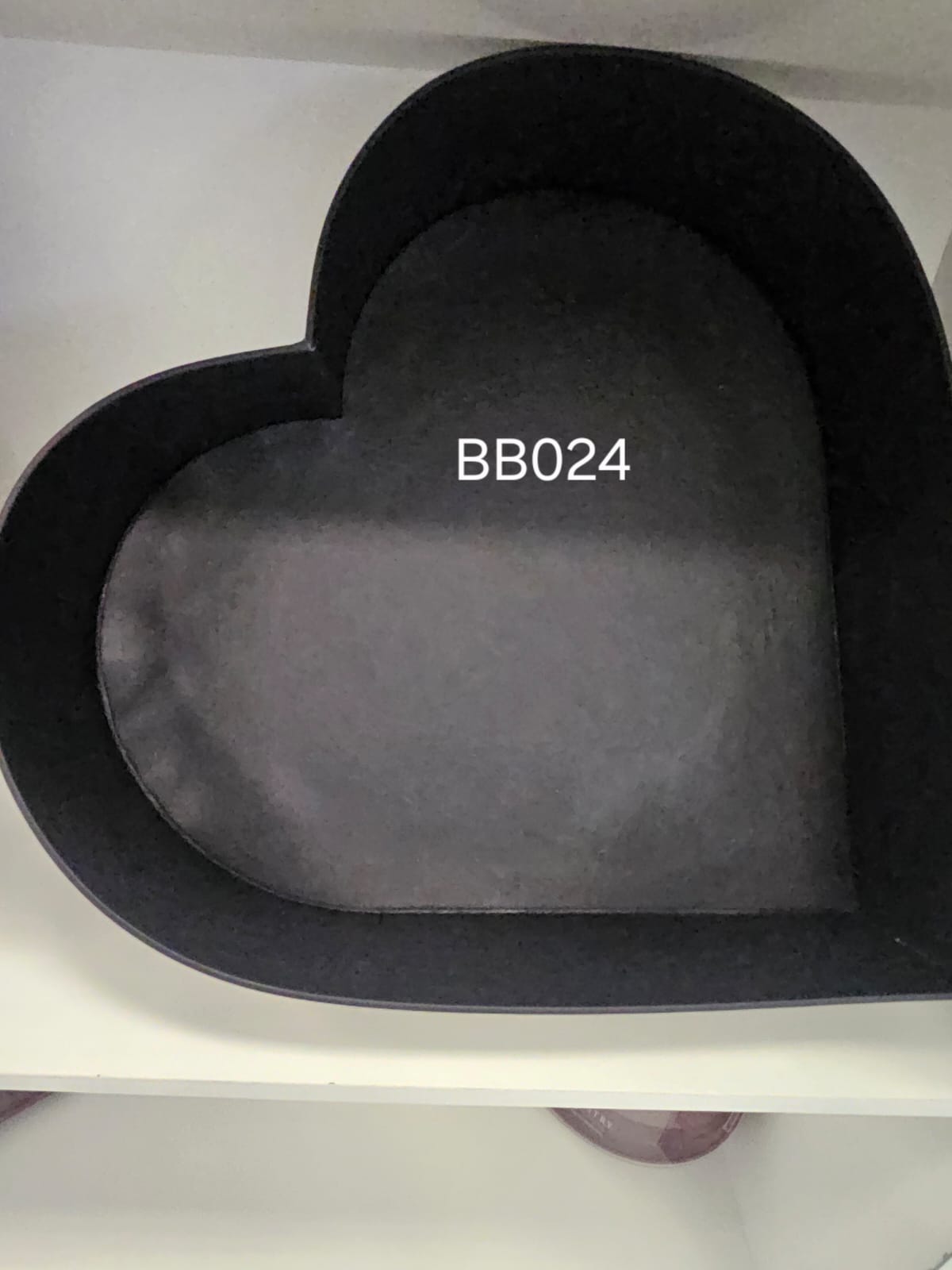 Heart-shaped box lined in charcoal velvet