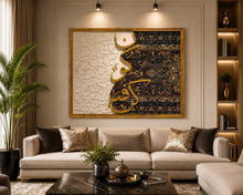 Large framed Arabic calligraphy panel in raised gold over ivory relief and a midnight-blue Persian weave, above a cream sofa